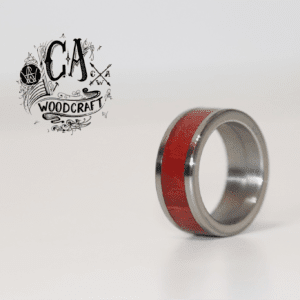 C A Woodcraft Wood and stainless steel ring with Pink Ivory. Hand made wooden jewellery