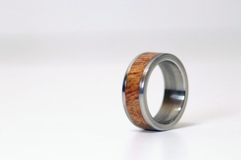 C A Woodcraft Wood and stainless steel ring with African Rosewood. Hand made wooden jewellery