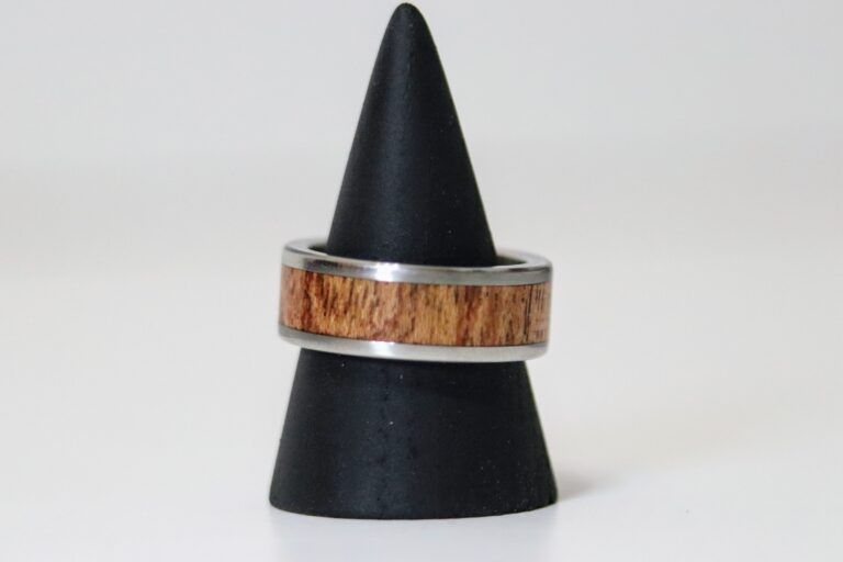 C A Woodcraft Wood and stainless steel ring with African Rosewood. Hand made wooden jewellery