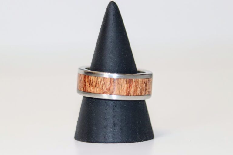 C A Woodcraft Wood and stainless steel ring with African Rosewood. Hand made wooden jewellery