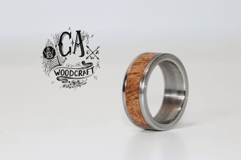 C A Woodcraft Wood and stainless steel ring with African Rosewood. Hand made wooden jewellery